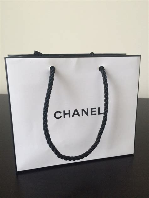 white chanel paper bag|Chanel paper shopping bag.